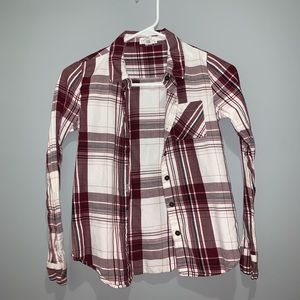 a maroon and white flannel